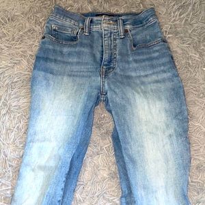 High rise skinny light blue washed jeans. Size 0